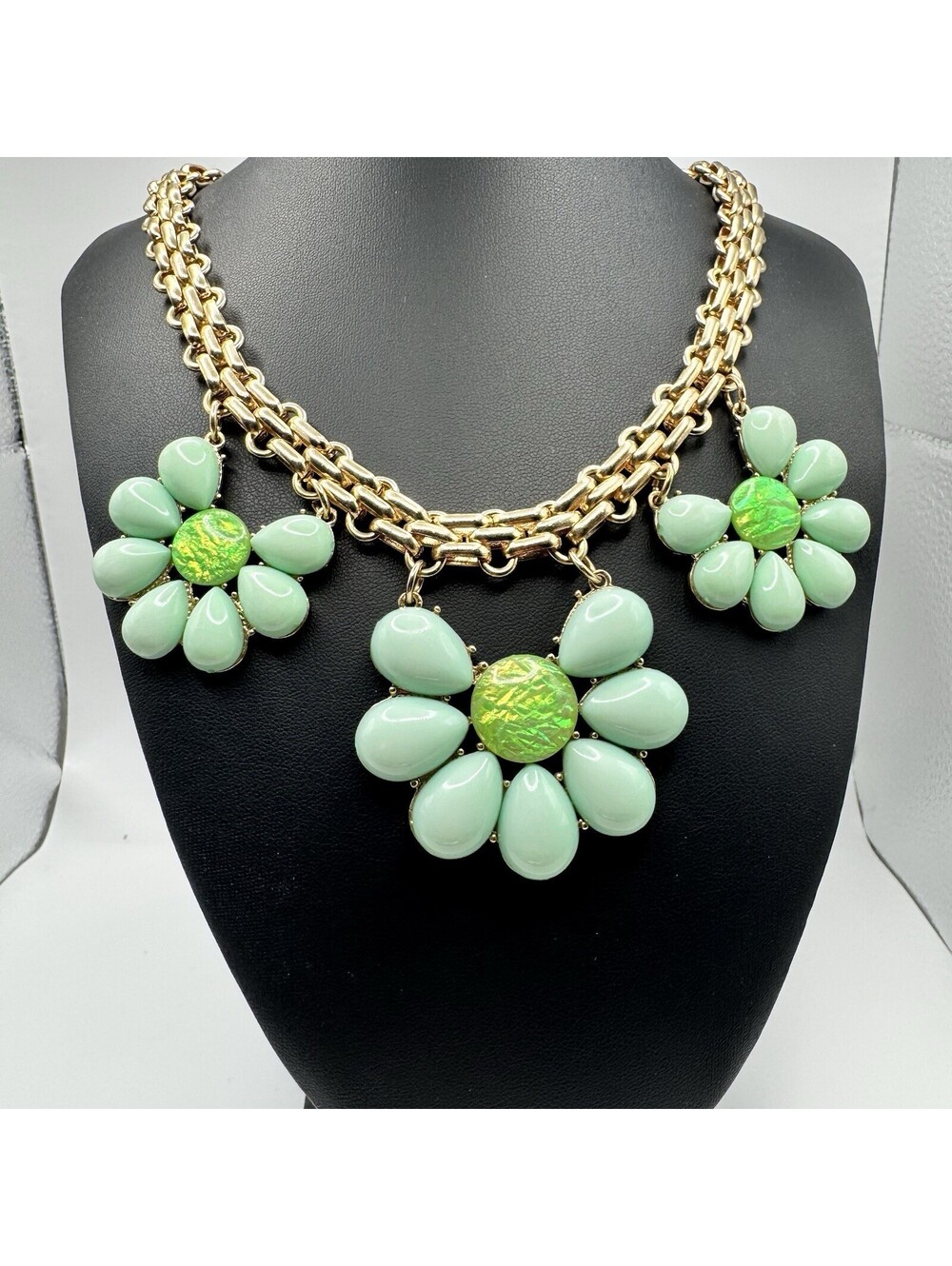 Mika Gold Tone Chain Necklace with Green Flower Pendants